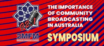 A red and blue sign with a microphone

AI-generated content may be incorrect.