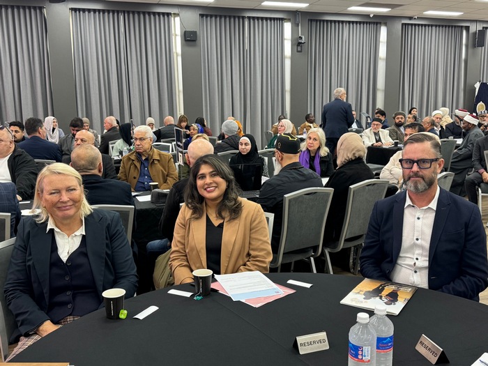 A group of people sitting at a round table

AI-generated content may be incorrect.