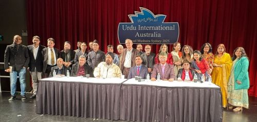 A group of people standing in front of a sign

AI-generated content may be incorrect.