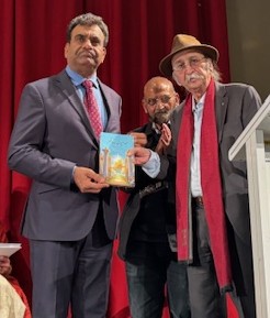 A group of men standing in front of a red curtain

AI-generated content may be incorrect.