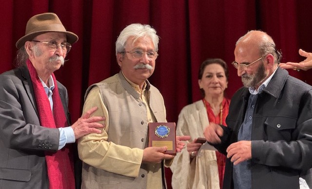 A group of men standing together

AI-generated content may be incorrect.