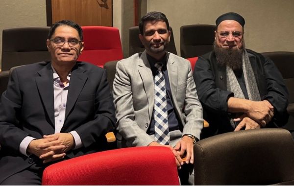 A group of men sitting in chairs

AI-generated content may be incorrect.