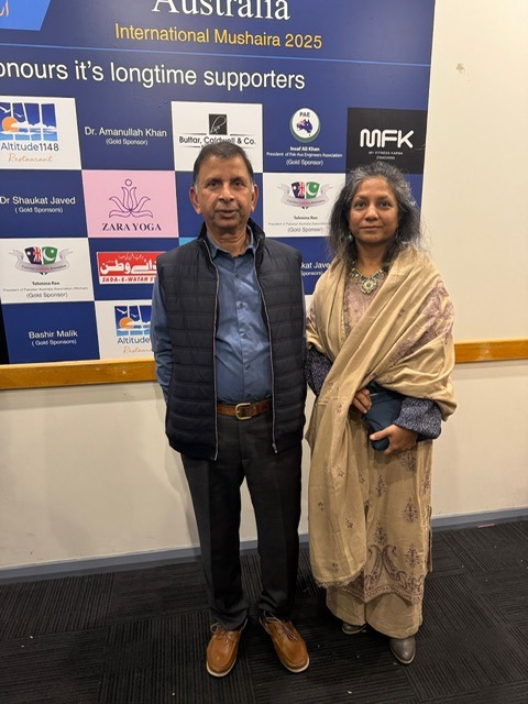 A person and person standing in front of a sign

AI-generated content may be incorrect.