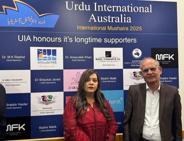 A person and person standing in front of a sign

AI-generated content may be incorrect.