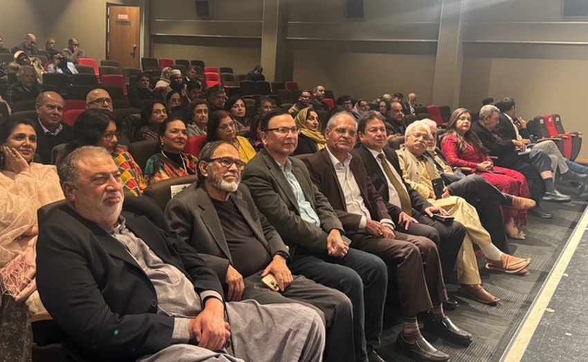 A group of people sitting in a room

AI-generated content may be incorrect.