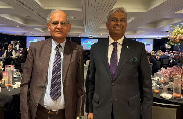 Two men in suits and ties

AI-generated content may be incorrect.