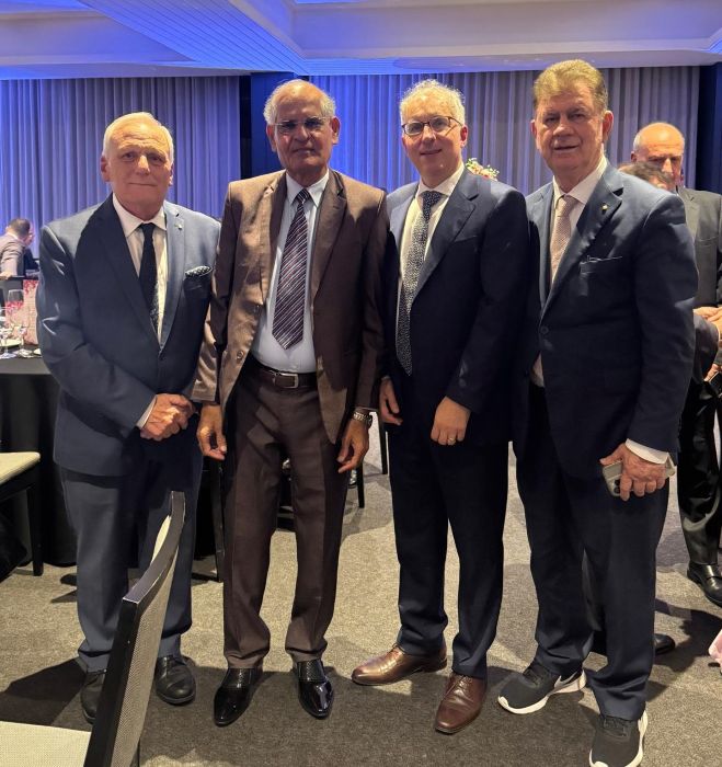 A group of men in suits

AI-generated content may be incorrect.