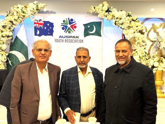 A group of men standing in front of a banner

AI-generated content may be incorrect.