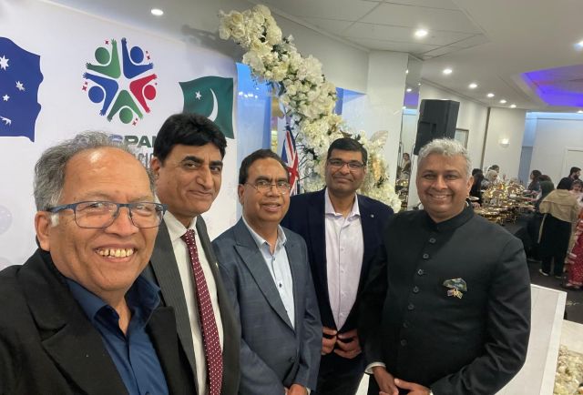 A group of men standing together

AI-generated content may be incorrect.