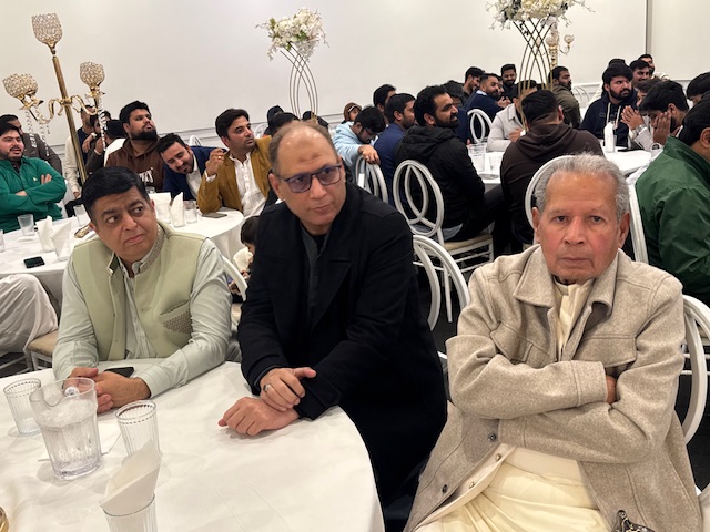 A group of men sitting at tables

AI-generated content may be incorrect.