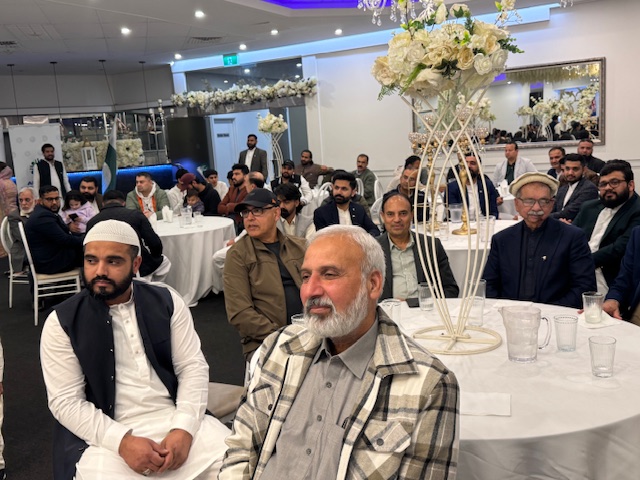 A group of men sitting at tables

AI-generated content may be incorrect.