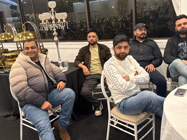 A group of men sitting in chairs

AI-generated content may be incorrect.