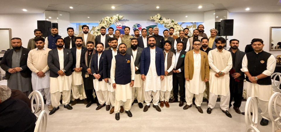 A group of men standing together

AI-generated content may be incorrect.