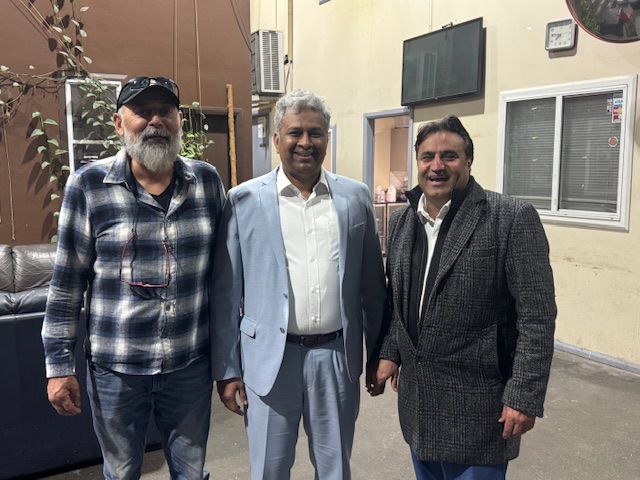 A group of men standing together outside

AI-generated content may be incorrect.