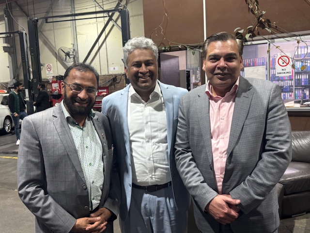 A group of men standing together

AI-generated content may be incorrect.