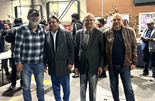 A group of men standing together

AI-generated content may be incorrect.