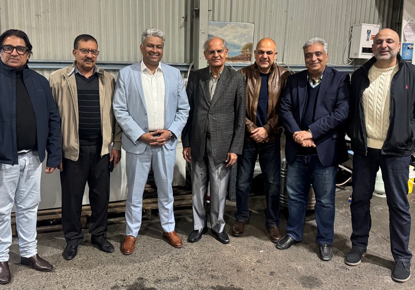 A group of men standing together

AI-generated content may be incorrect.