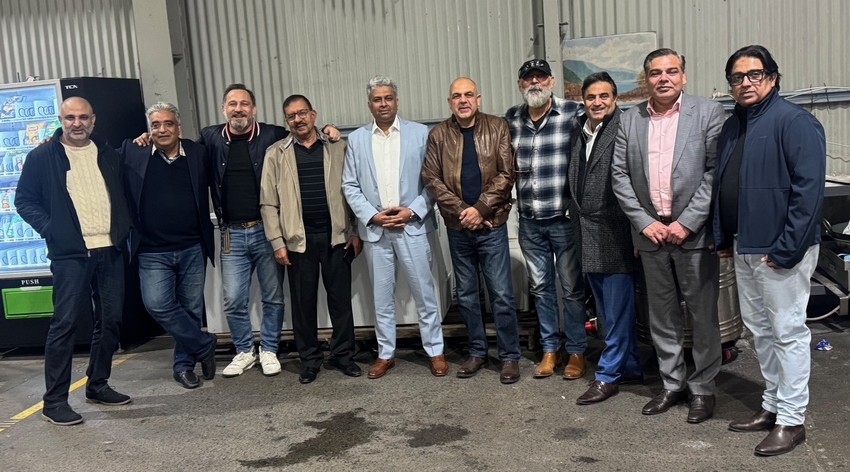 A group of men standing together

AI-generated content may be incorrect.