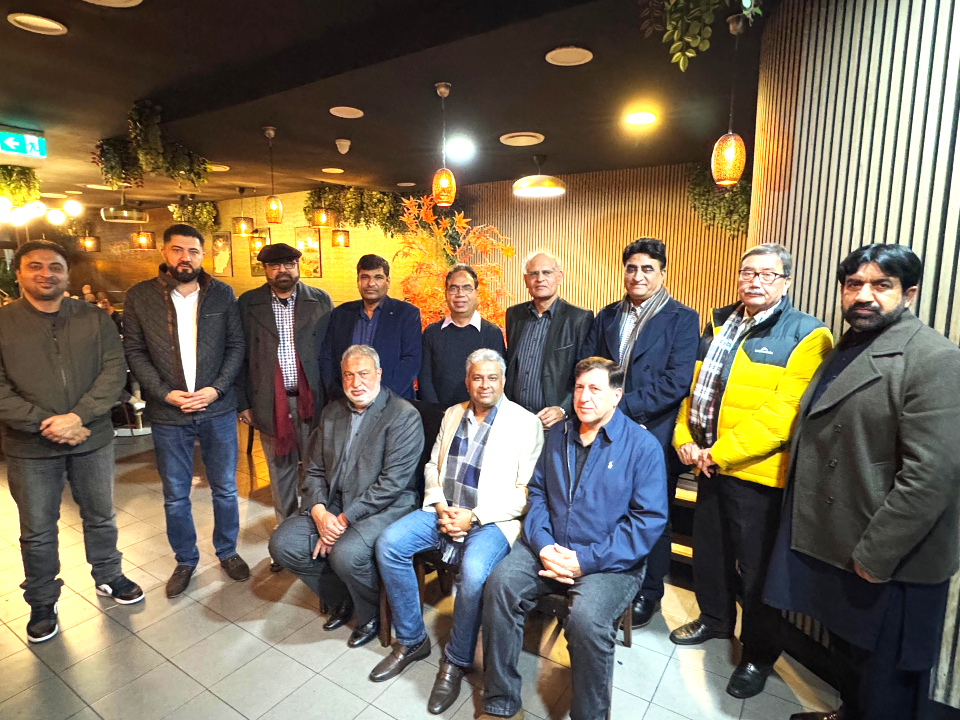 A group of men posing for a photo

AI-generated content may be incorrect.