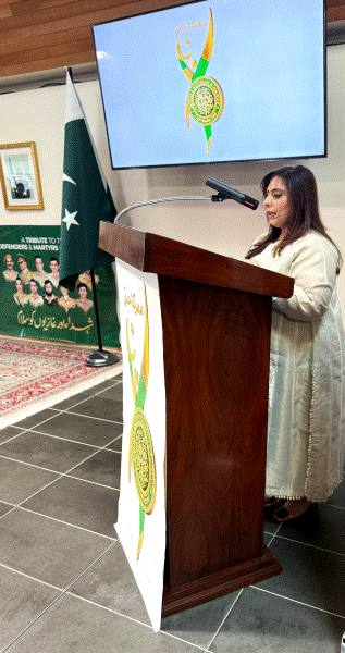 A person standing at a podium

AI-generated content may be incorrect.