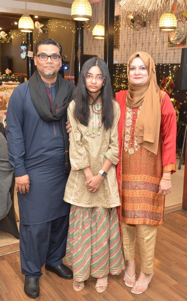 A group of people posing for a photo

AI-generated content may be incorrect.