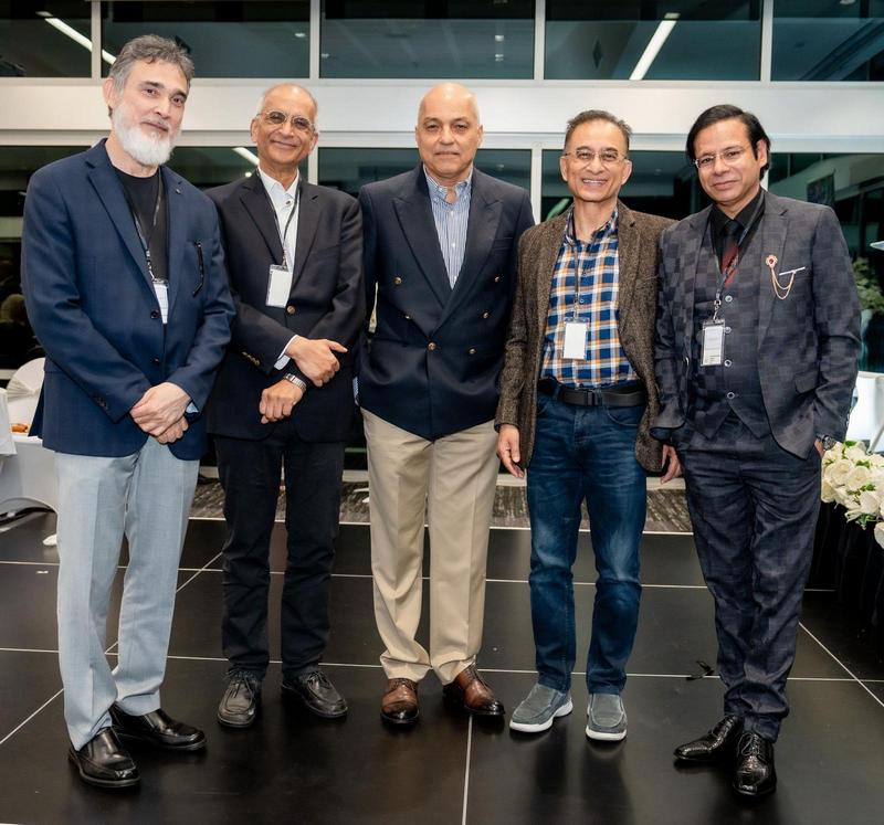 A group of men standing together

AI-generated content may be incorrect.