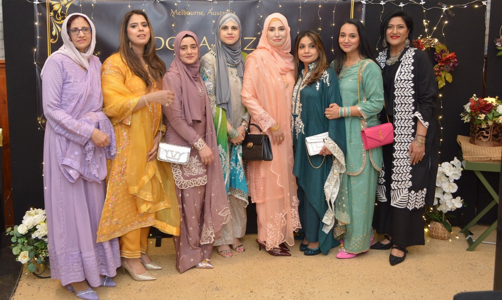 A group of women wearing colorful dresses

AI-generated content may be incorrect.