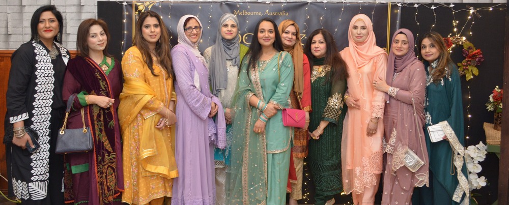 A group of women in colorful dresses

AI-generated content may be incorrect.