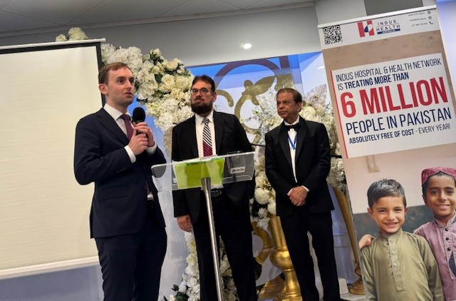 A group of men standing on a podium

AI-generated content may be incorrect.