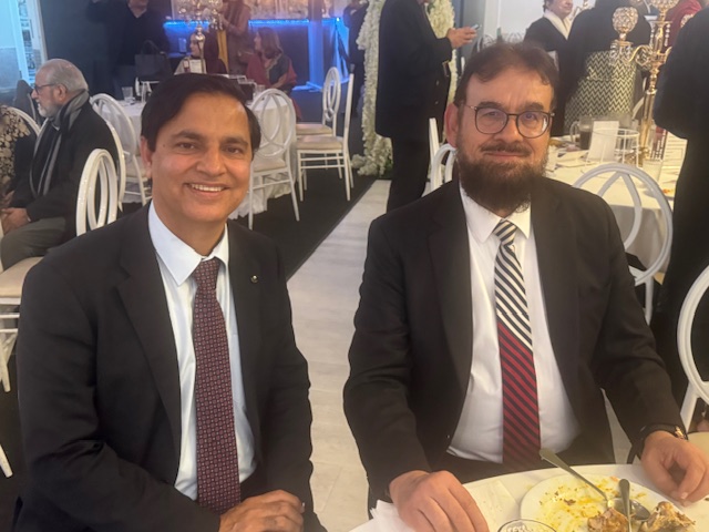 Two men sitting at a table

AI-generated content may be incorrect.