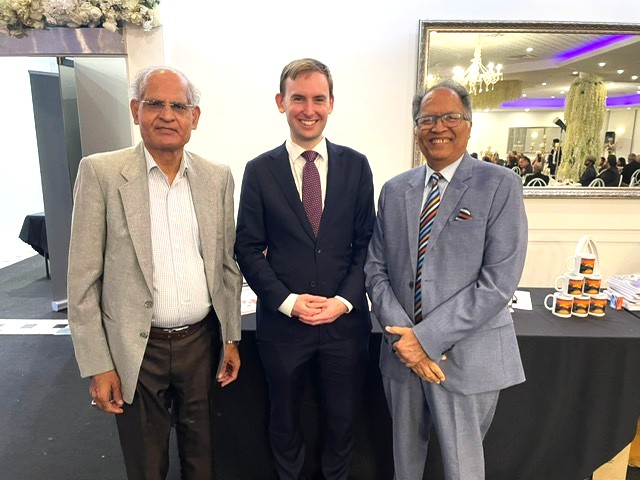 A group of men standing together

AI-generated content may be incorrect.