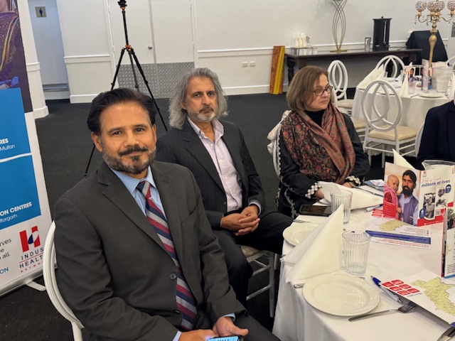 A group of people sitting at a table

AI-generated content may be incorrect.