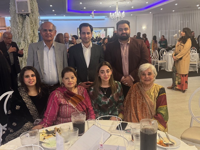 A group of people posing for a photo

AI-generated content may be incorrect.