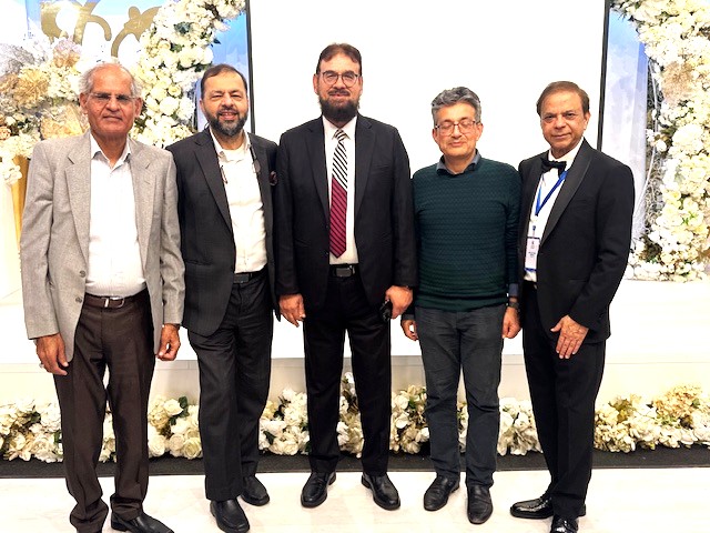 A group of men standing together

AI-generated content may be incorrect.