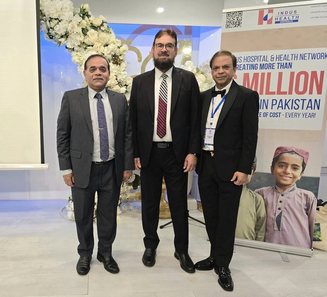 A group of men standing in front of a sign

AI-generated content may be incorrect.