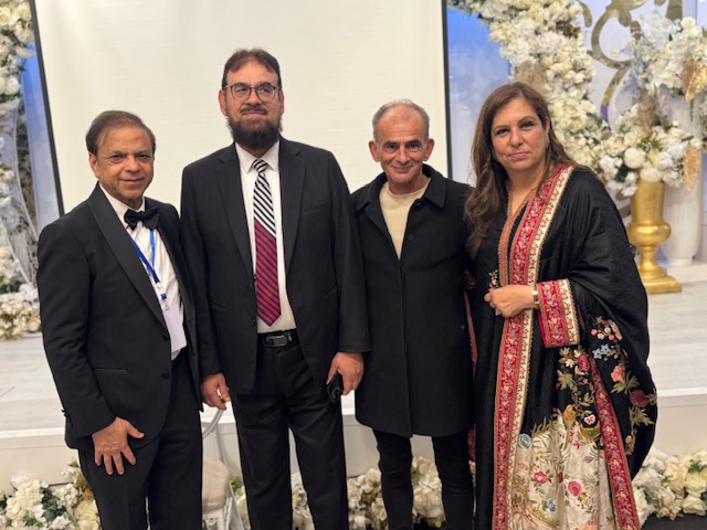 A group of people posing for a photo

AI-generated content may be incorrect.