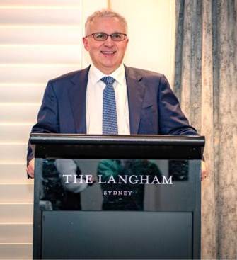 A person standing at a podium

AI-generated content may be incorrect.