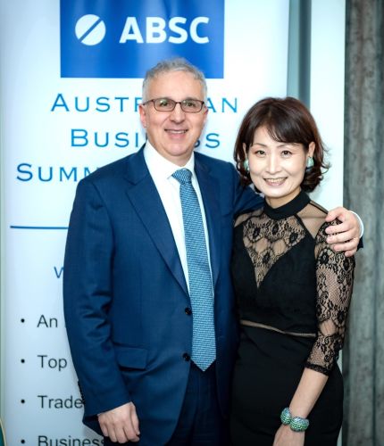 A person and person posing for a picture

AI-generated content may be incorrect.