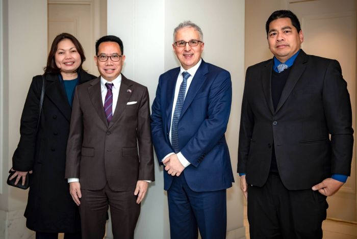 A group of people in suits

AI-generated content may be incorrect.