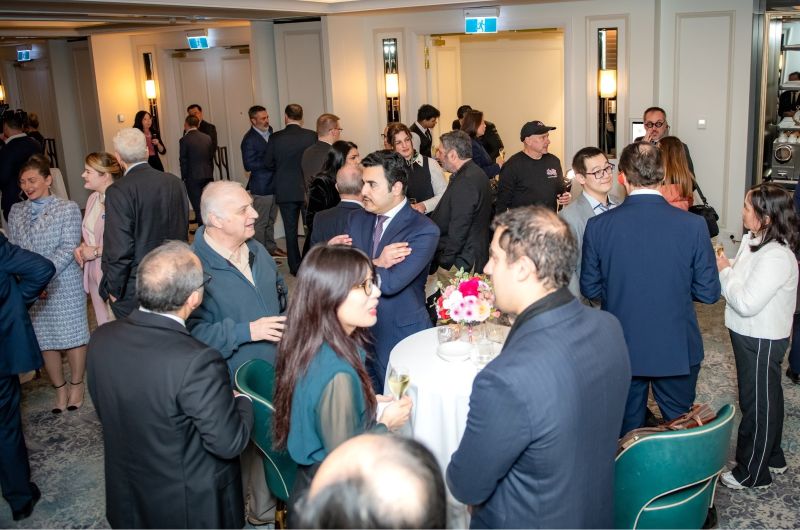 A group of people in a room

AI-generated content may be incorrect.