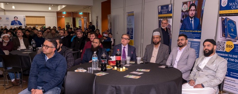 A group of men sitting at a round table

AI-generated content may be incorrect.