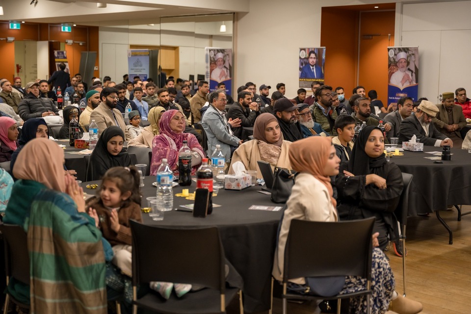 A group of people sitting at a table

AI-generated content may be incorrect.