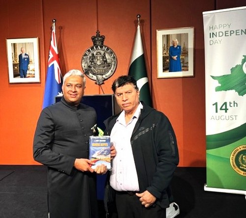 Two men standing in front of flags

AI-generated content may be incorrect.