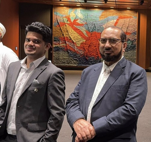 A group of men in suits

AI-generated content may be incorrect.