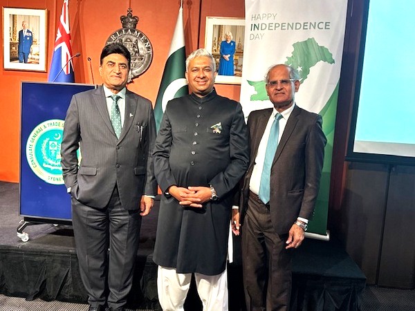 A group of men standing in front of a screen

AI-generated content may be incorrect.