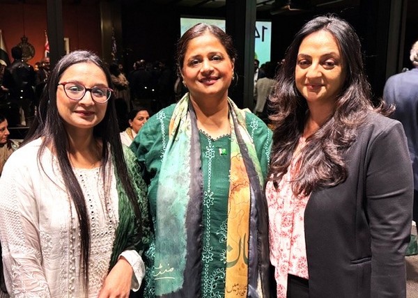 A group of women standing together

AI-generated content may be incorrect.