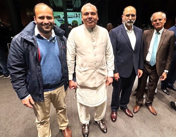 A group of men standing together

AI-generated content may be incorrect.