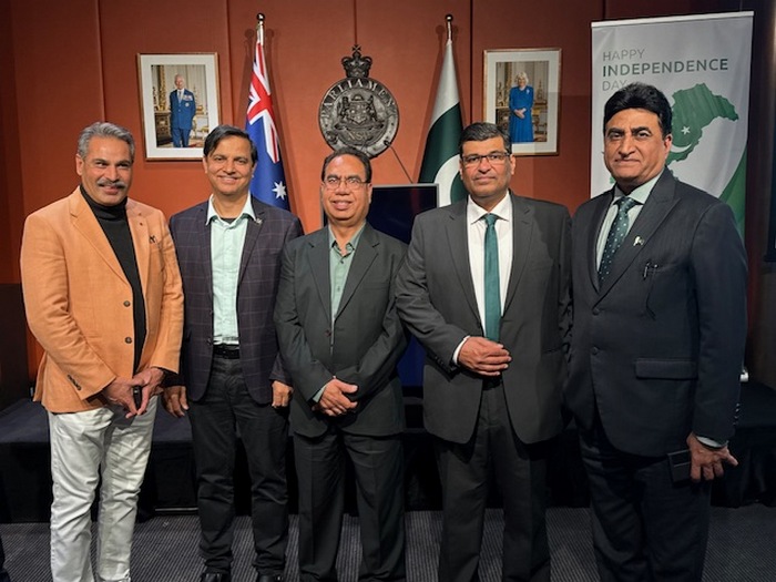 A group of men standing together

AI-generated content may be incorrect.