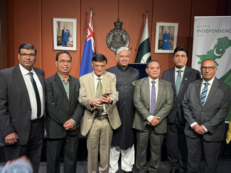 A group of men standing together

AI-generated content may be incorrect.