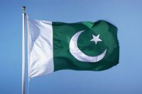 A green and white flag with a crescent and star

AI-generated content may be incorrect.
